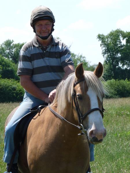 Poohsmate riding Beth